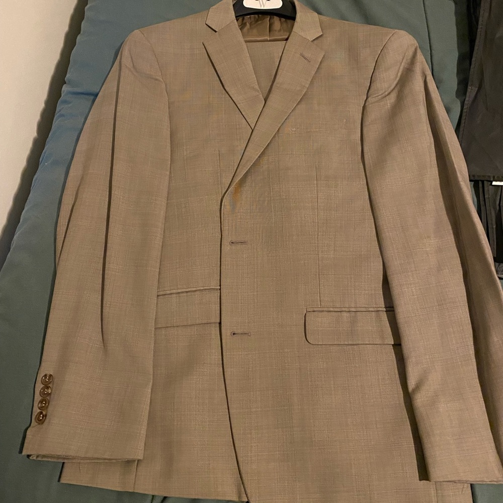 Tan suit